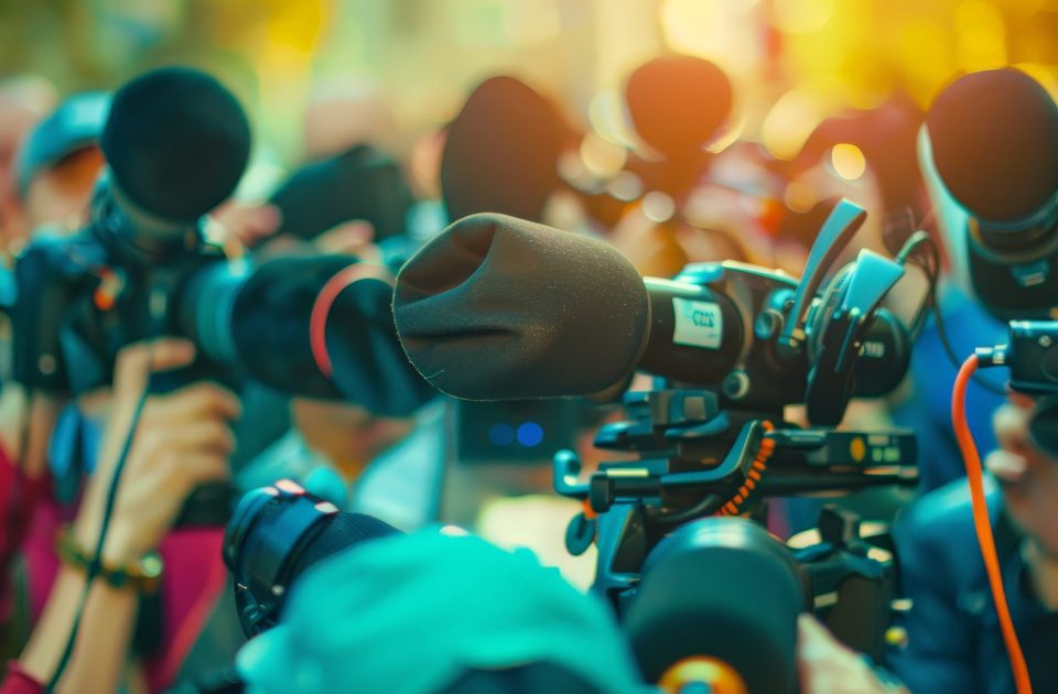 Visualize the comprehensive efforts of a corporate public relations team, where media strategies are crafted.